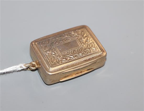 A George IV engraved silver gilt vinaigrette, Ledsam & Vale, Birmingham, 1824, 32mm.